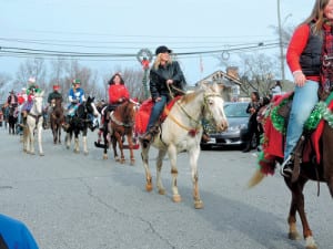 A long line of horses joined Saturday’s Patrick County Christmas Parade on Main Street in Stuart. (Photo by Linda Hylton)
