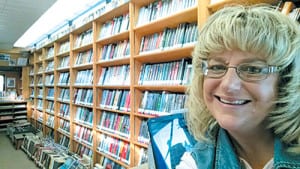 The familiar face that greeted library branch visitors is now behind the wheel of the Patrick County Library Bookmobile. Tammy Cope travels throughout the county and to every elementary school. Former driver Cecil Holland now works at the Mechanicsville library branch. 