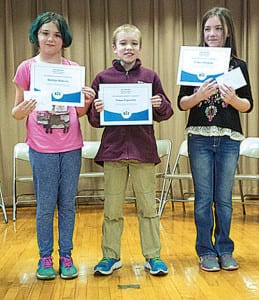 Winners of the Spelling Bee at Woolwine Elementary School are (left to right): third place, Bobbijo Roberts; second place, Nolan Poperowitz; and first place, Sydney Hopkins.